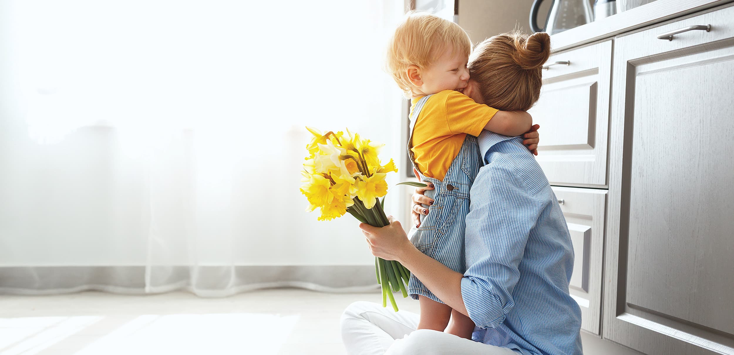 Westfield home interior of toddler hugging mother